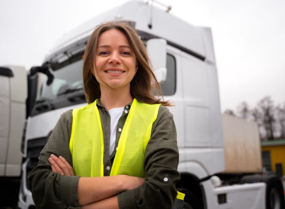 Woman in front of a truck